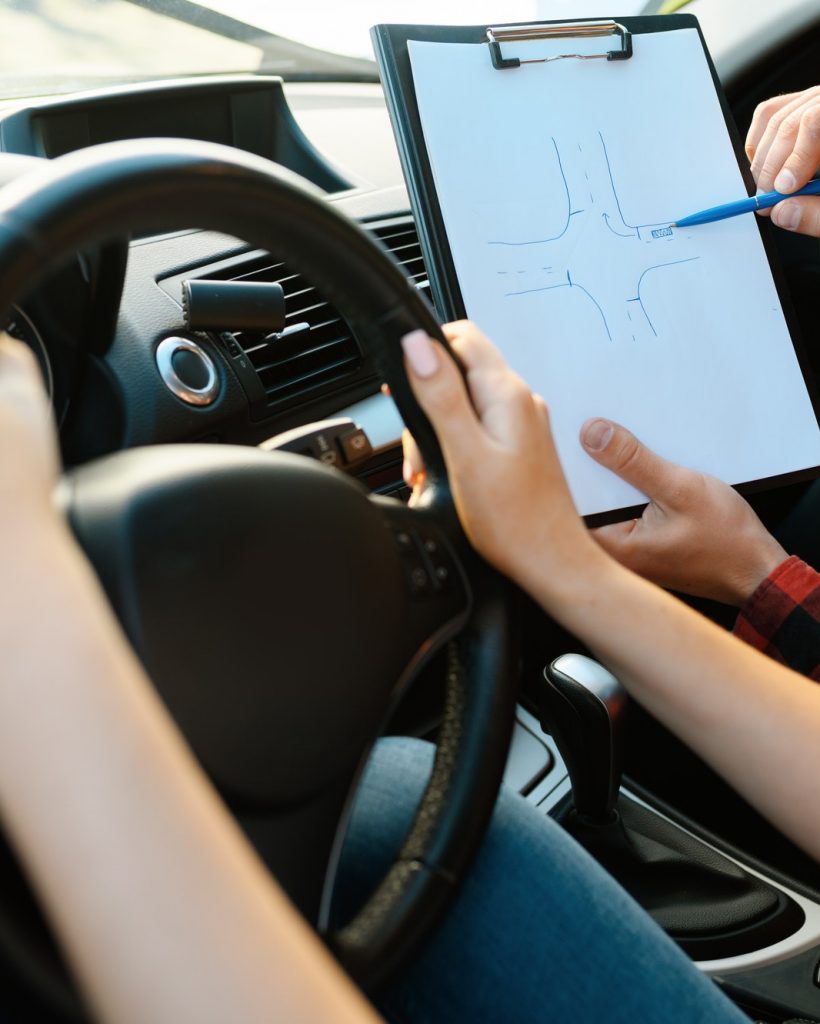 woman-and-man-with-checklist-driving-school.jpg